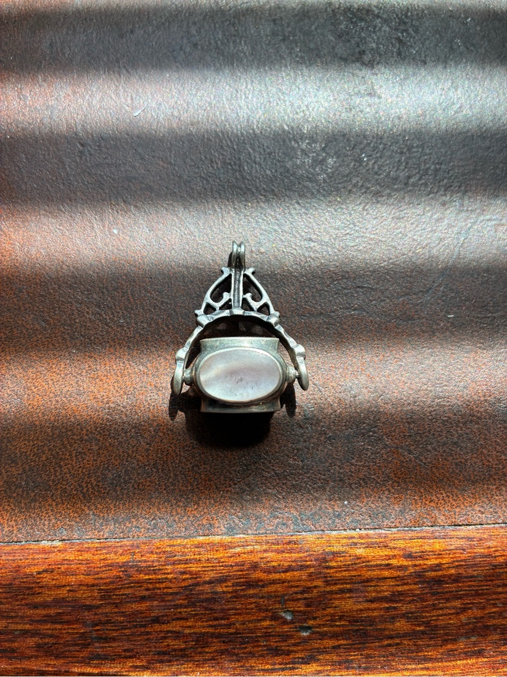 Vintage fob with spinning 4 sided center piece